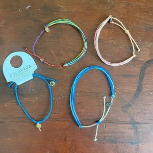 4 puravida bracelets one with tags